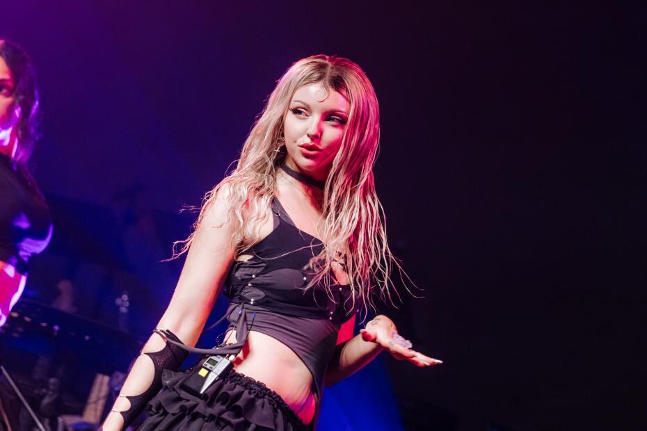 Larissa Lambert performing on stage at KZ Shanghai